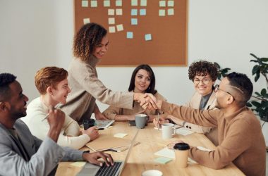 pexels photo 3184291 3184291 Diverse team collaborating in a meeting, showcasing teamwork and cooperation in a modern workplace.
